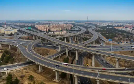 Modern highway interchange with multiple bridges symbolizing infrastructure investment